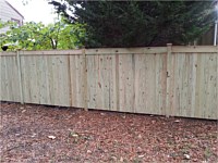 <b>Vertical Board Wood Privacy Fence with Fascia Board Top and New England Caps</b>